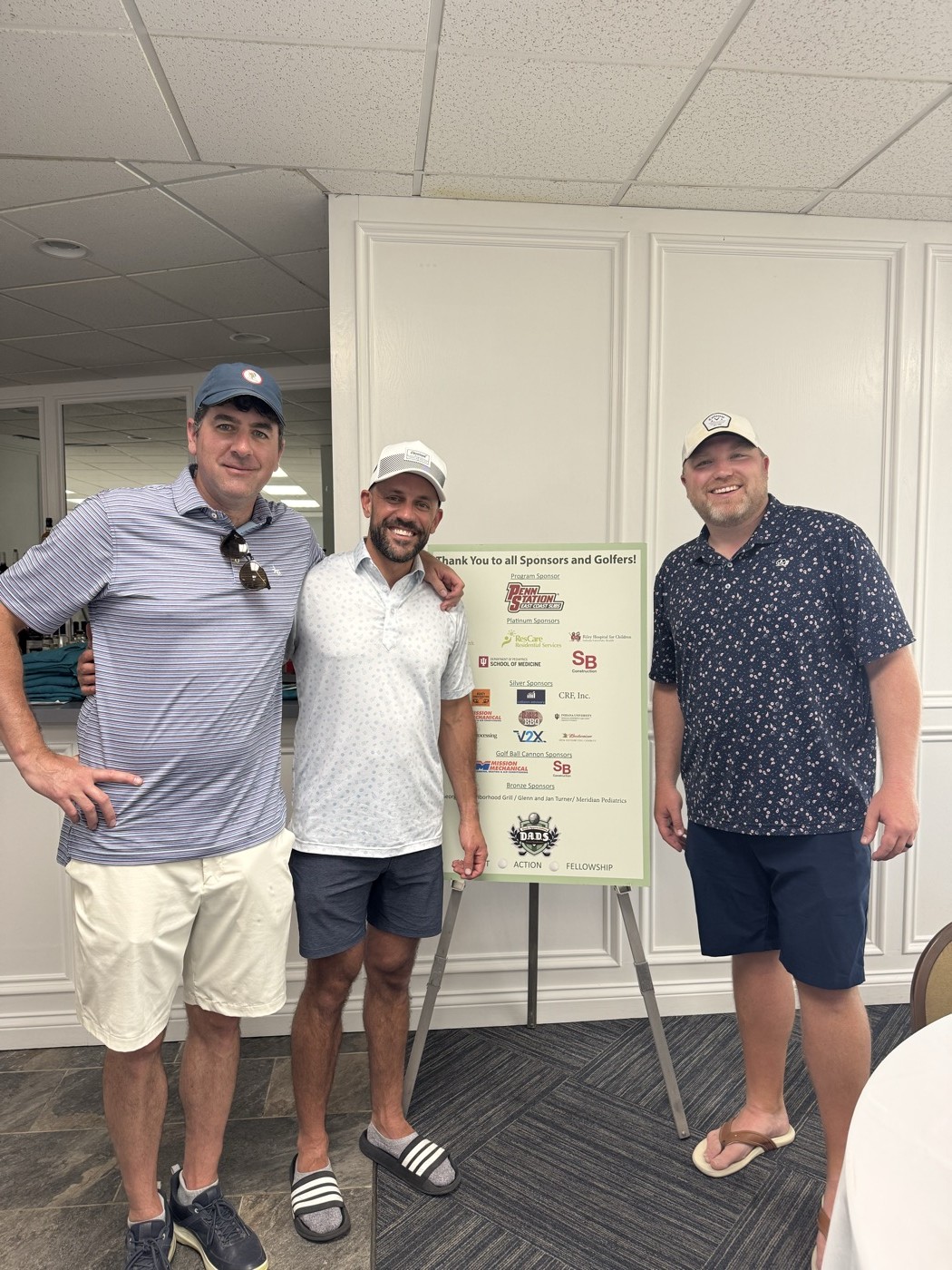 Doug Higgins with friends Andy Seitz and Chris Ash at the Down Syndrome Indiana D.A.D.S. golf outing