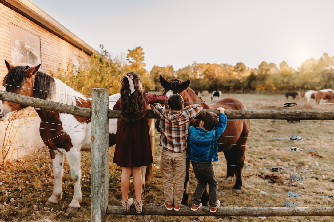 The Higgins kids at the fence